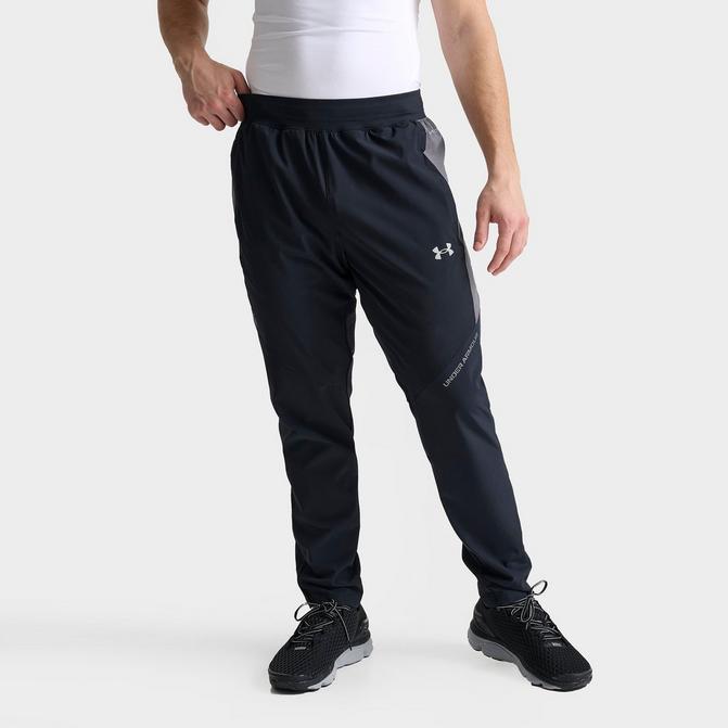 [angle] view of Men's Under Armour UA Storm Woven Pants in Black/Grey Click to zoom
