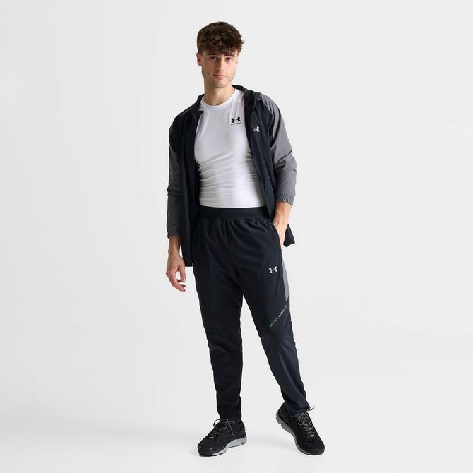 [angle] view of Men's Under Armour UA Storm Woven Pants in Black/Grey Click to zoom