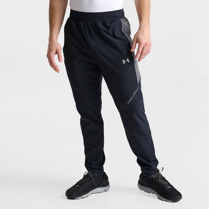 [angle] view of Men's Under Armour UA Storm Woven Pants in Black/Grey Click to zoom