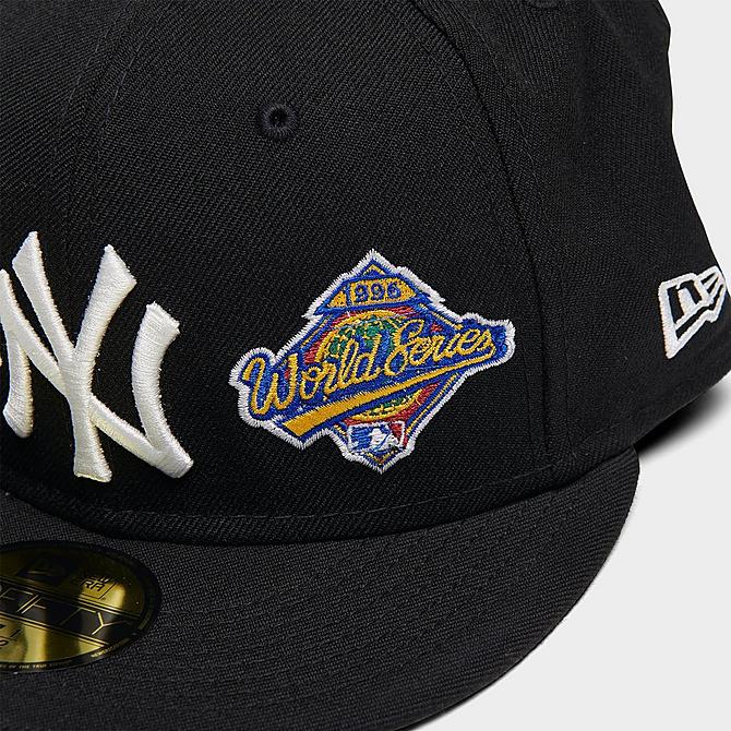 Left view of New Era New York Yankees MLB World Champs 59FIFTY Fitted Hat in Black/Team Click to zoom