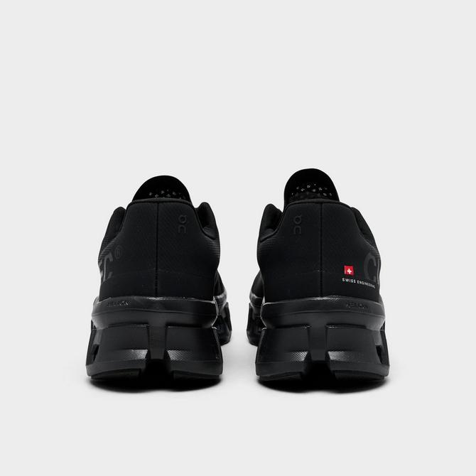 Left view of Men's On Cloudmonster Running Shoes in Black/Black Click to zoom