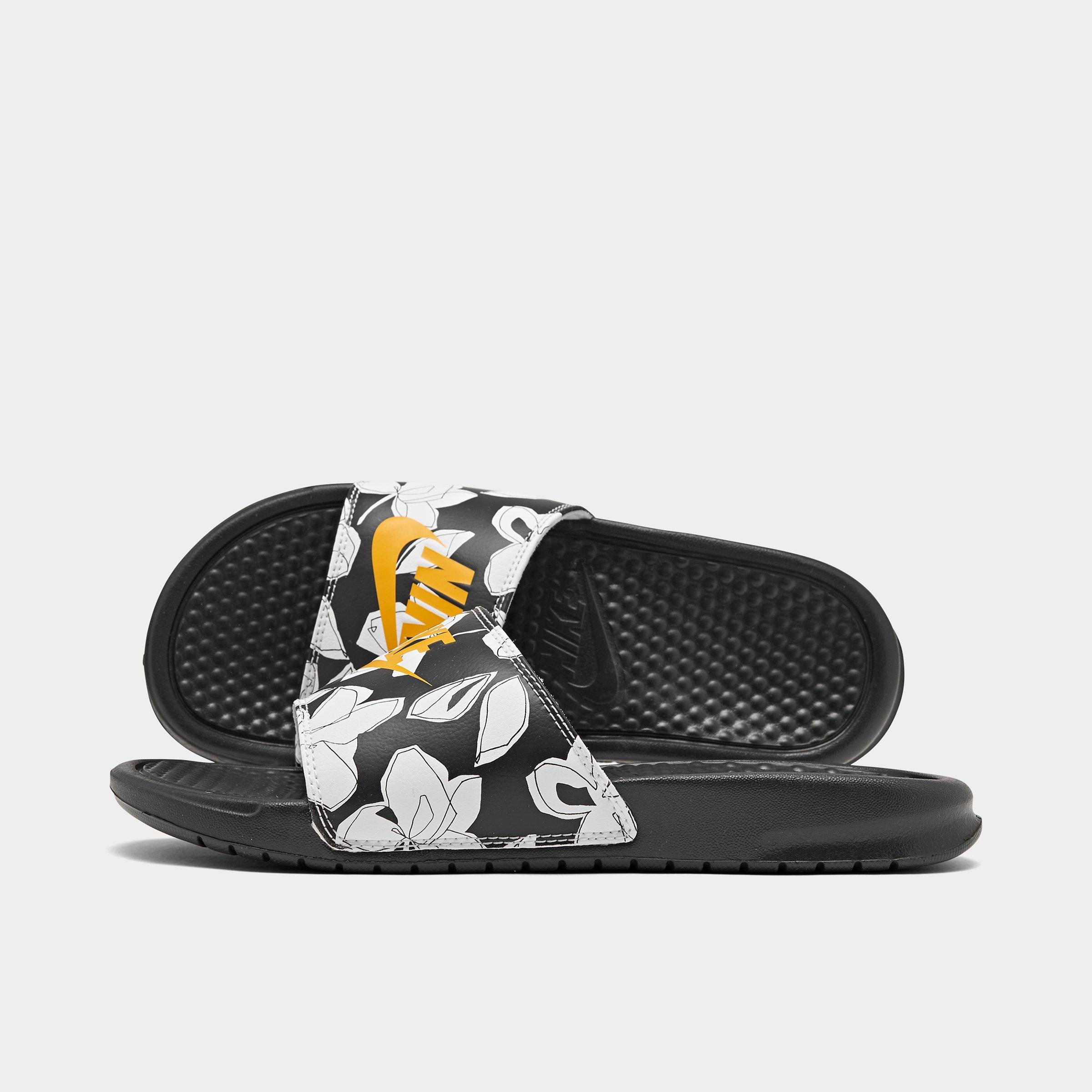 black and yellow nike slides