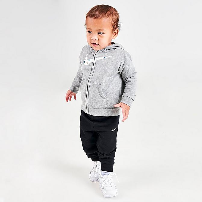 Front view of Boys' Infant Nike Swooshfetti Parade 3-Piece Full-Zip Hoodie, Jogger Pants and Long-Sleeve Bodysuit Set (Sizes 12M-24M) in White/Black/Grey/Multi Click to zoom