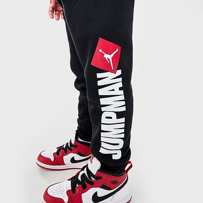 On Model 5 view of Boys' Toddler Jordan Essentials Fleece AOP Hoodie and Jogger Pants Set in Red/Black/White Click to zoom