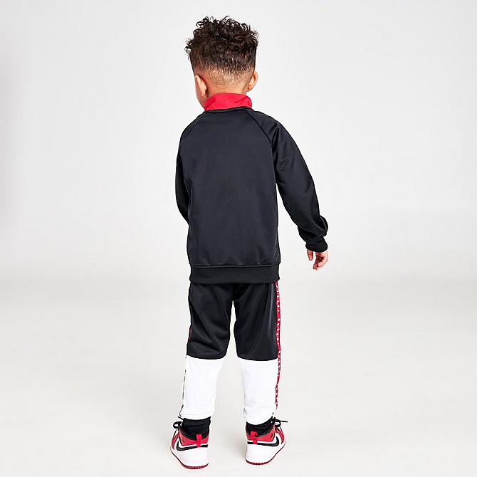 Front Three Quarter view of Boys' Toddler Jordan Air Blocked Tricot Track Jacket and Jogger Pants Set in Black/White/Red Click to zoom