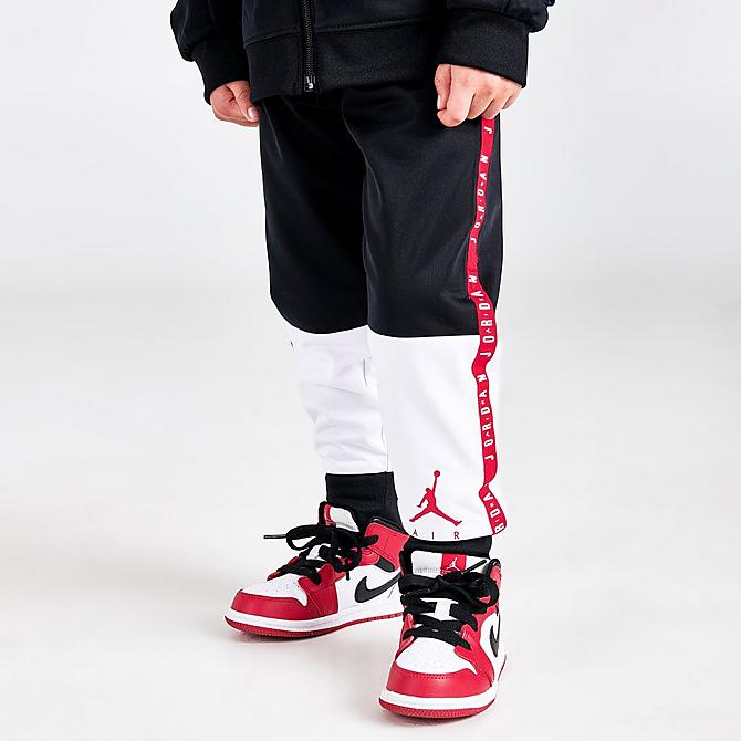 Back Right view of Boys' Toddler Jordan Air Blocked Tricot Track Jacket and Jogger Pants Set in Black/White/Red Click to zoom