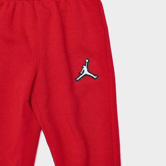 On Model 6 view of Kids' Toddler Jordan Essentials Fleece Hoodie and Jogger Pants Set in Gym Red/White Click to zoom