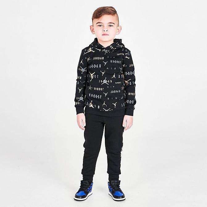 Front view of Boys' Toddler Jordan Highlight Allover Print Fleece Hoodie and Jogger Pants Set in Black/Gold Click to zoom