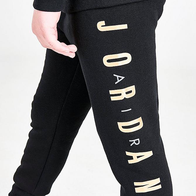 On Model 5 view of Boys' Toddler Jordan Highlight Allover Print Fleece Hoodie and Jogger Pants Set in Black/Gold Click to zoom