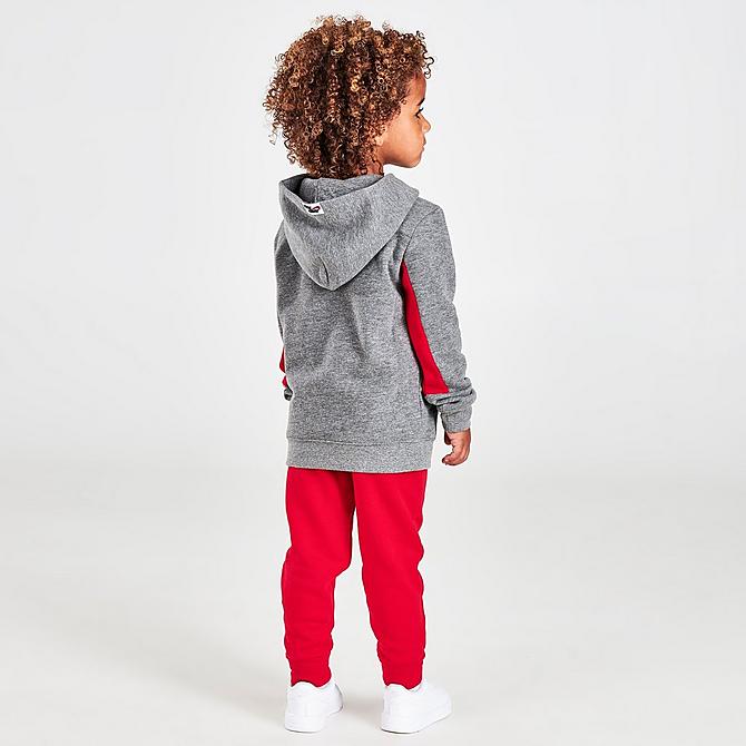 Front Three Quarter view of Kids' Toddler Jumpman by Nike Hoodie, T-Shirt and Jogger Pants Set (3-Piece) in Grey/Red/White Click to zoom