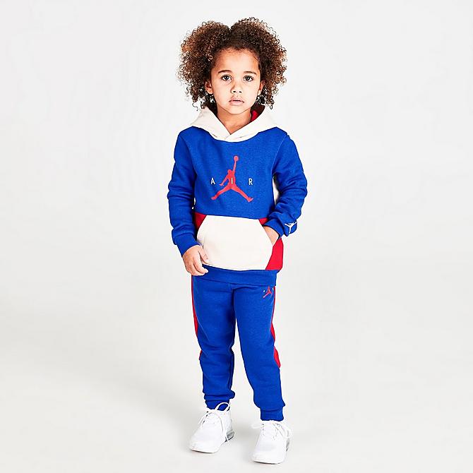 Front Three Quarter view of Boys' Toddler Jordan Wild Utility Pullover Hoodie in Racer Blue/Pearl White/Gym Red Click to zoom