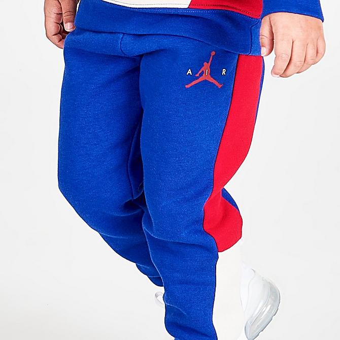 On Model 5 view of Boys' Toddler Jordan Wild Utility Jogger Pants in Racer Blue/Pearl White/Gym Red Click to zoom
