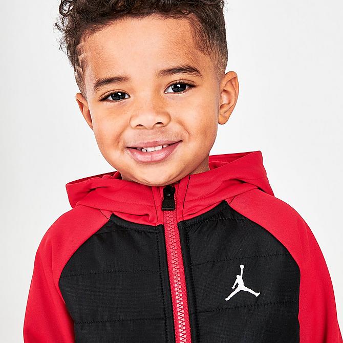 On Model 5 view of Boys' Toddler Jordan Therma-FIT Full-Zip Jacket in Black/Gym Red Click to zoom