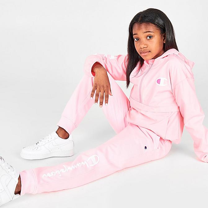 Front view of Girls' Champion Script Logo Fleece Jogger Pants in Pink Candy Click to zoom