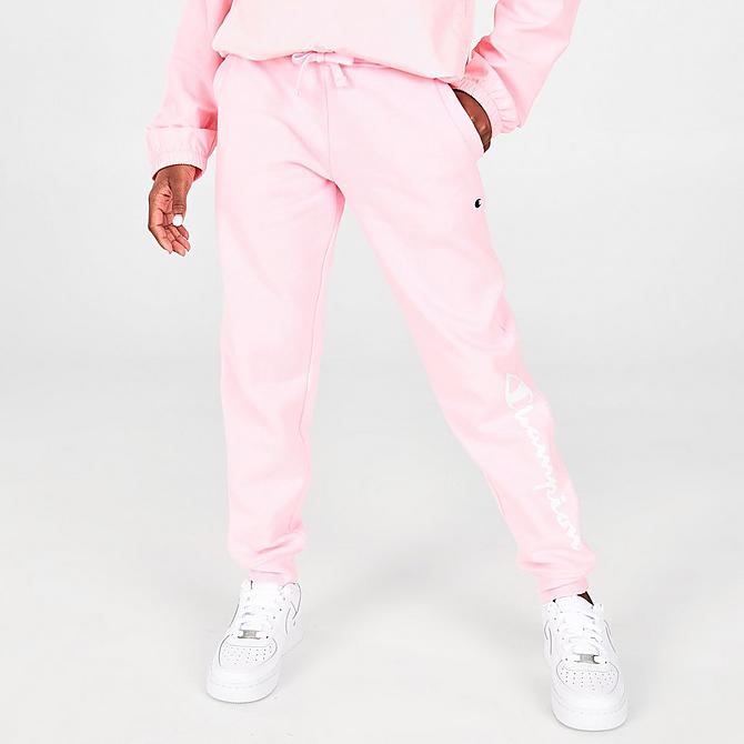 Front Three Quarter view of Girls' Champion Script Logo Fleece Jogger Pants in Pink Candy Click to zoom