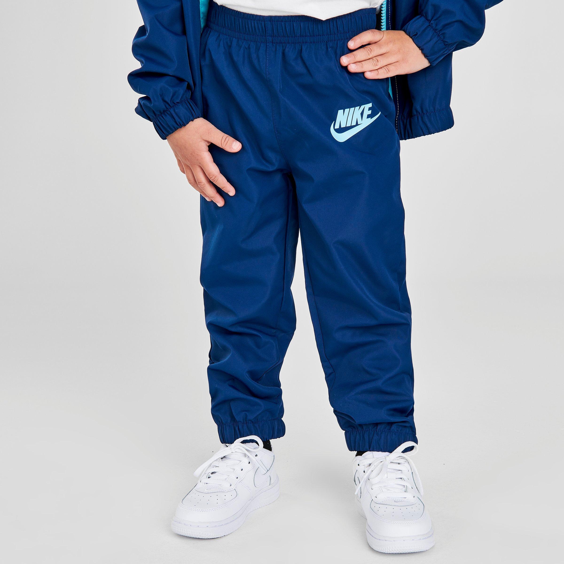 nike windrunner pants blue