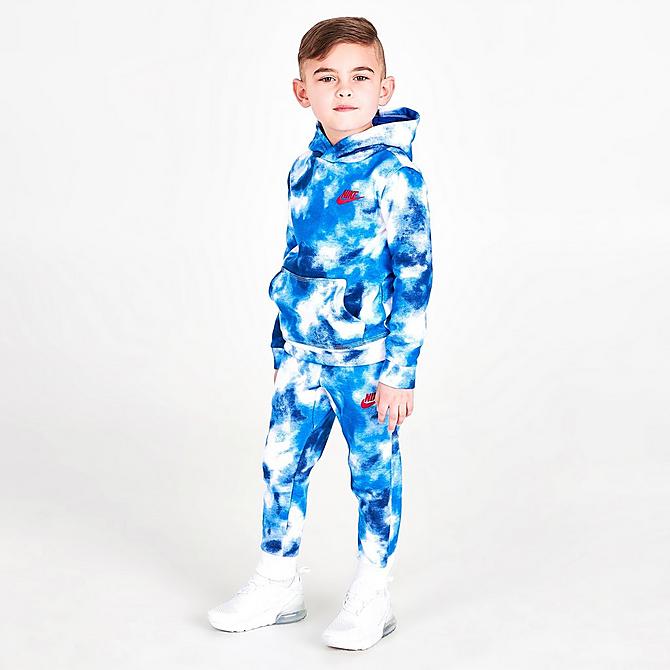 Front Three Quarter view of Boys' Toddler Nike Allover Print Club Fleece Hoodie in Blue/White Click to zoom