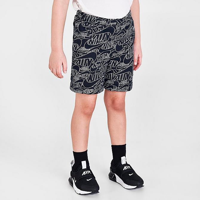 Back Left view of Boys' Toddler Nike Sportswear Read Allover Print French Terry Shorts in Black/White Click to zoom