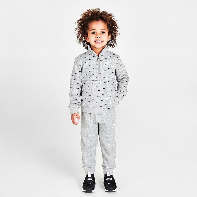 Front view of Boys' Toddler Nike Sportswear Swoosh Print Half-Zip Sweatshirt and Jogger Pants in Carbon Heather/Black Click to zoom