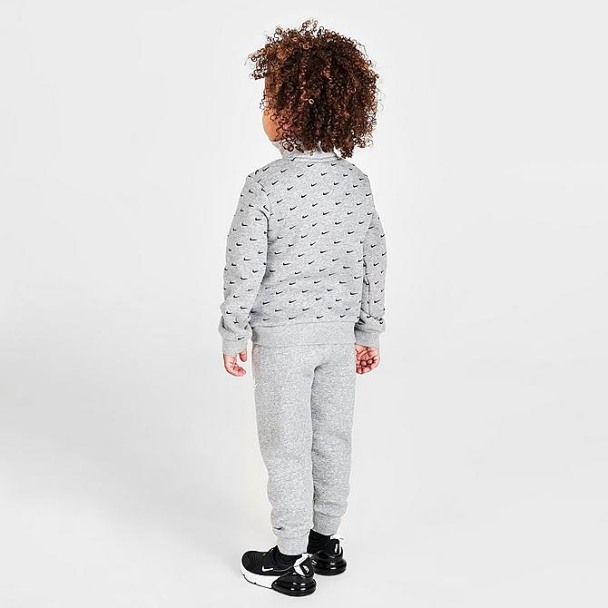 Front Three Quarter view of Boys' Toddler Nike Sportswear Swoosh Print Half-Zip Sweatshirt and Jogger Pants in Carbon Heather/Black Click to zoom