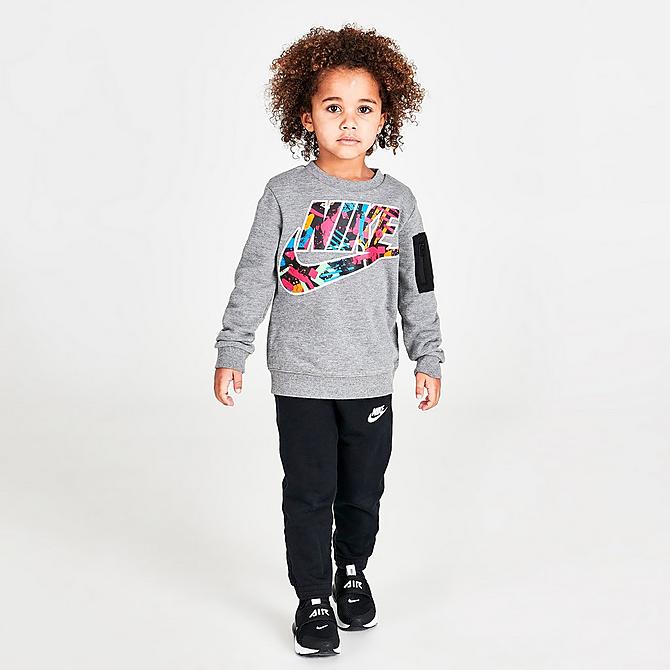 Front Three Quarter view of Boys' Toddler Nike Sportswear Thrill Print Zip Pocket Crewneck Sweatshirt in Grey Heather/Multi Click to zoom