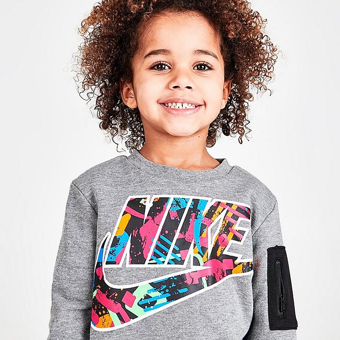 On Model 5 view of Boys' Toddler Nike Sportswear Thrill Print Zip Pocket Crewneck Sweatshirt in Grey Heather/Multi Click to zoom