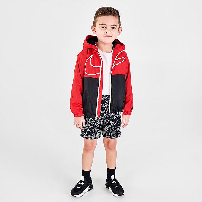 Front Three Quarter view of Boys' Toddler Nike Sportswear Swoosh Fleece Lined Jacket in University Red/Black/White Click to zoom