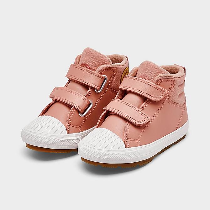 Three Quarter view of Girls' Toddler Converse Chuck Taylor All Star Berkshire Leather High Top Casual Boots in Rust Pink/Rust Pink/Pale Putty Click to zoom