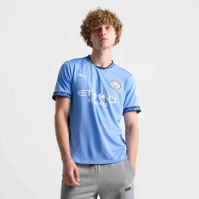 [angle] view of Men's Puma Manchester City 24-25 Home Replica Soccer Jersey in Team Light Blue/Marine Blue Click to zoom