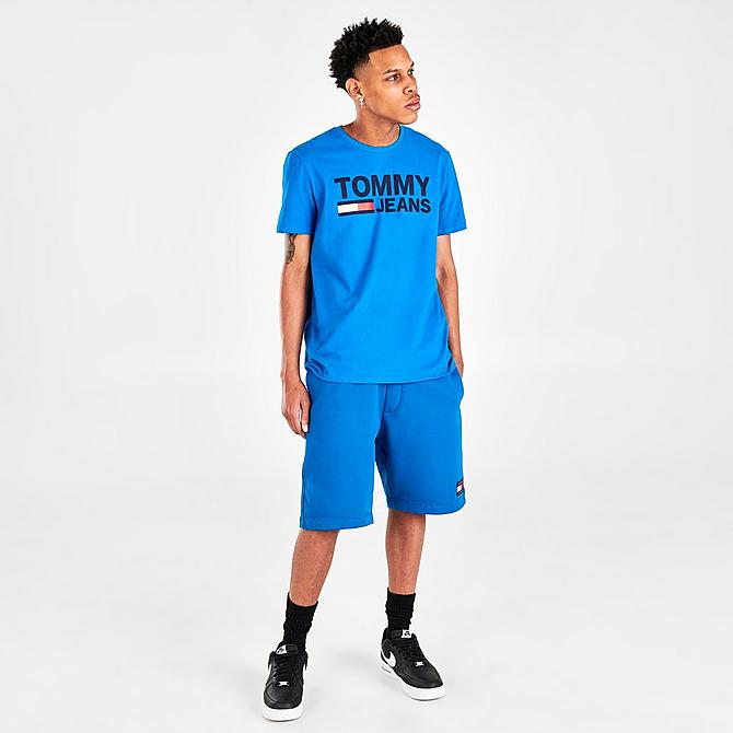 Front Three Quarter view of Men's Tommy Jeans Lockup Graphic Print T-Shirt in Blue Craze Click to zoom