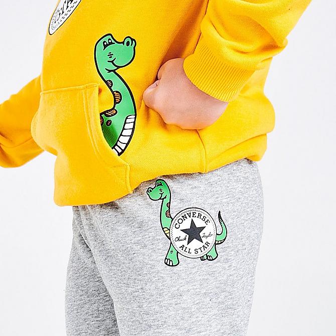 On Model 6 view of Boys' Toddler Converse Dino Friends Hoodie and Jogger Pants Set in Yellow/Grey Click to zoom