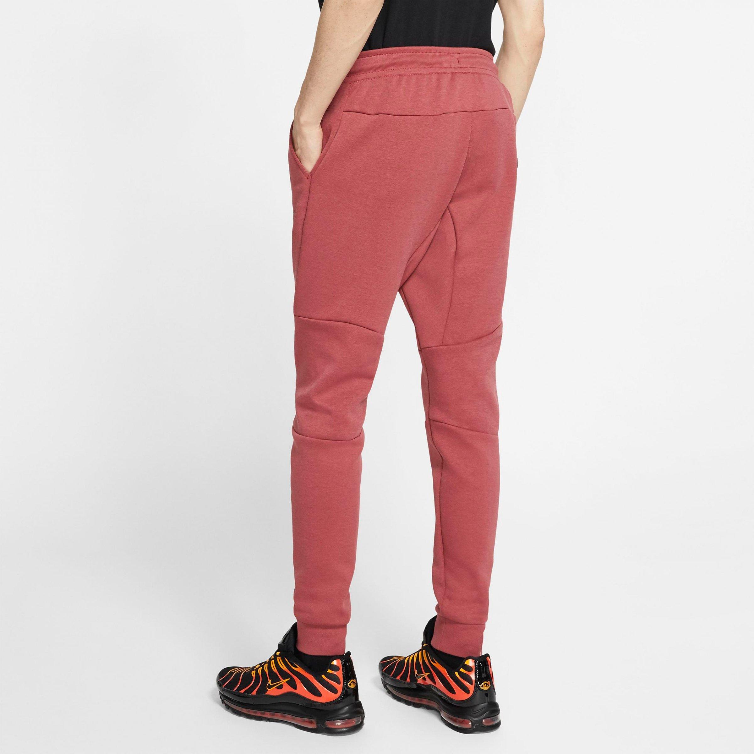 pink nike tech pants