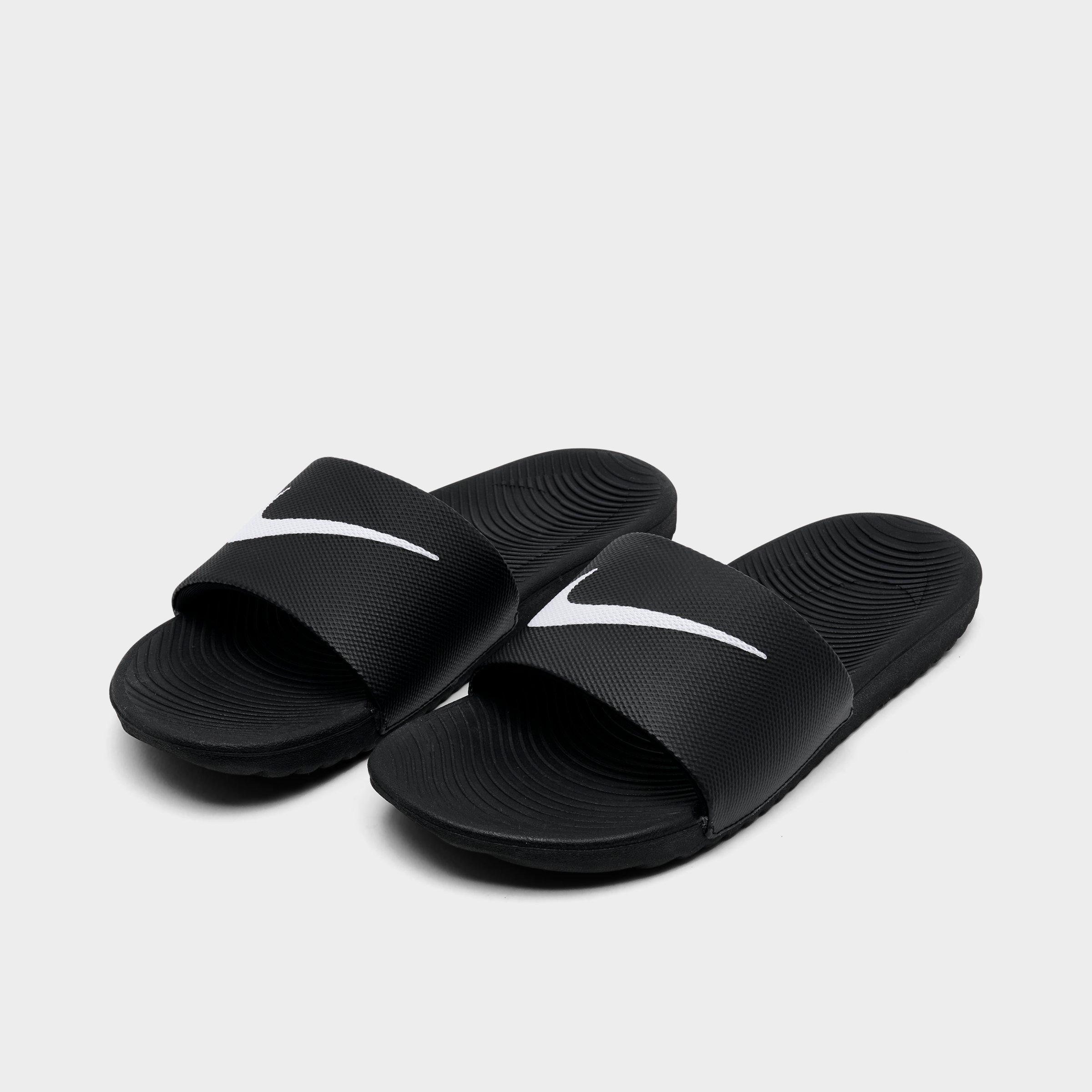 nike kawa slides black and gold