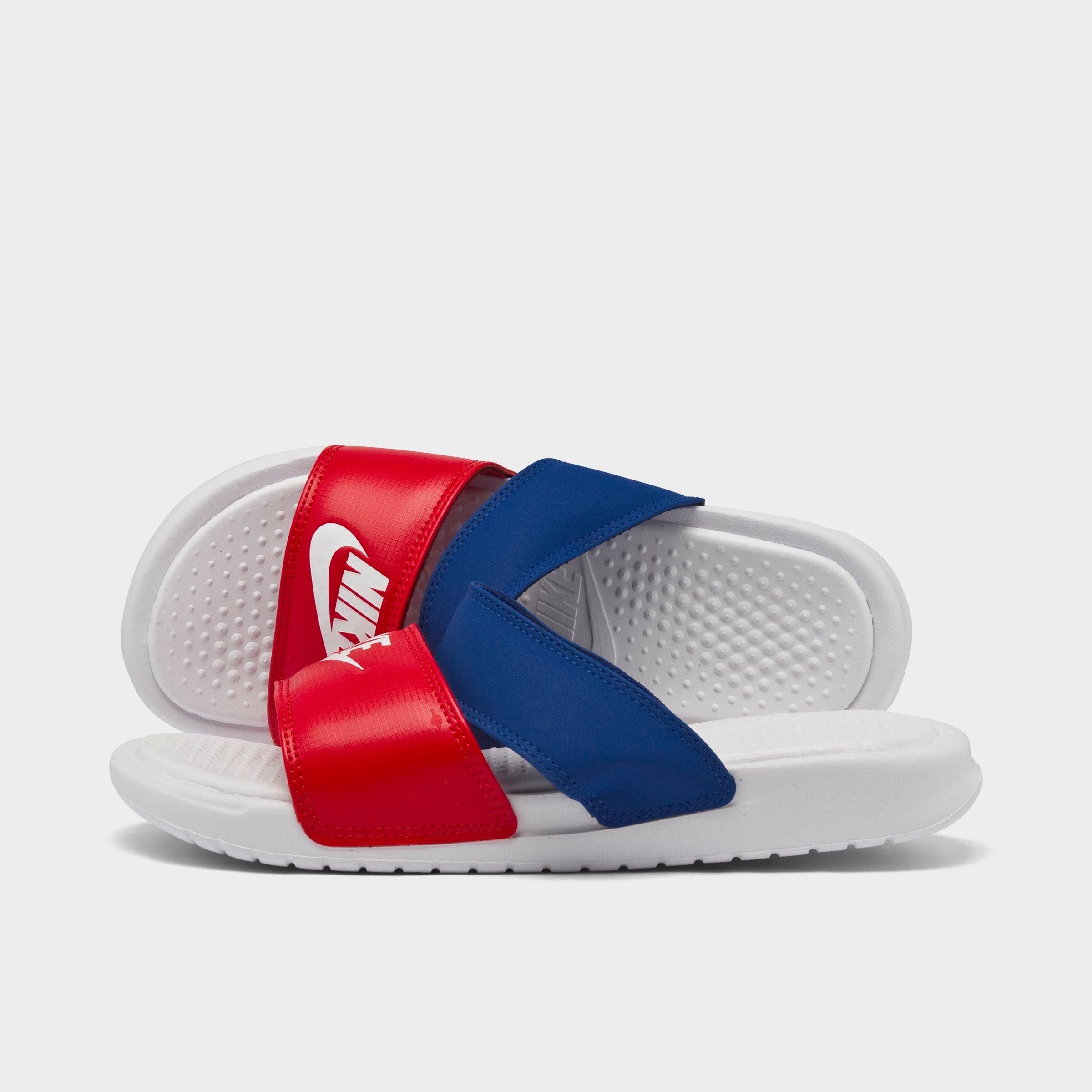 red and blue nike slides