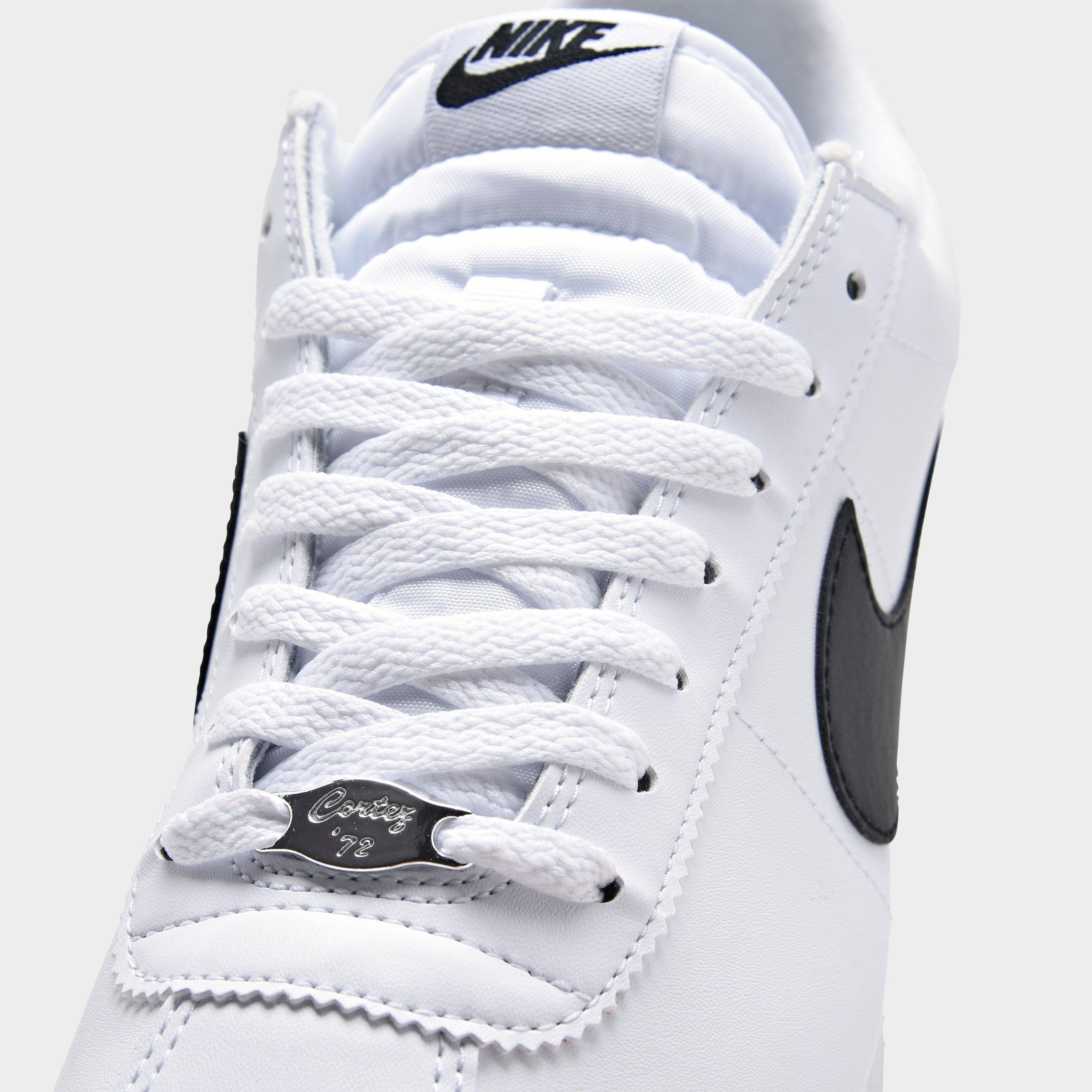 white leather nike mens