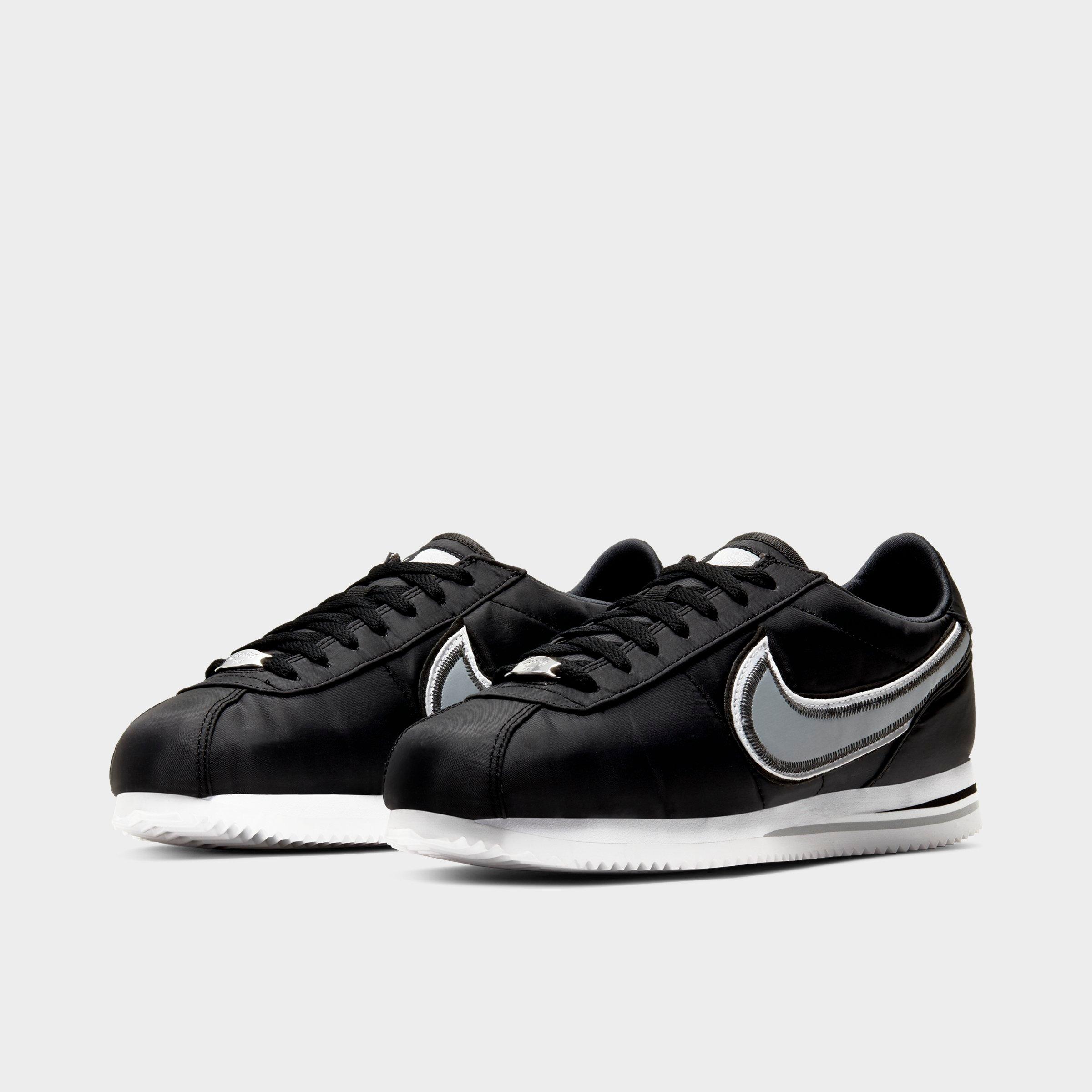 nike cortez black and orange