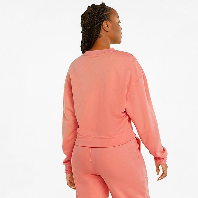 Front Three Quarter view of Women's Puma Loungewear Tracksuit in Peach Pink Click to zoom