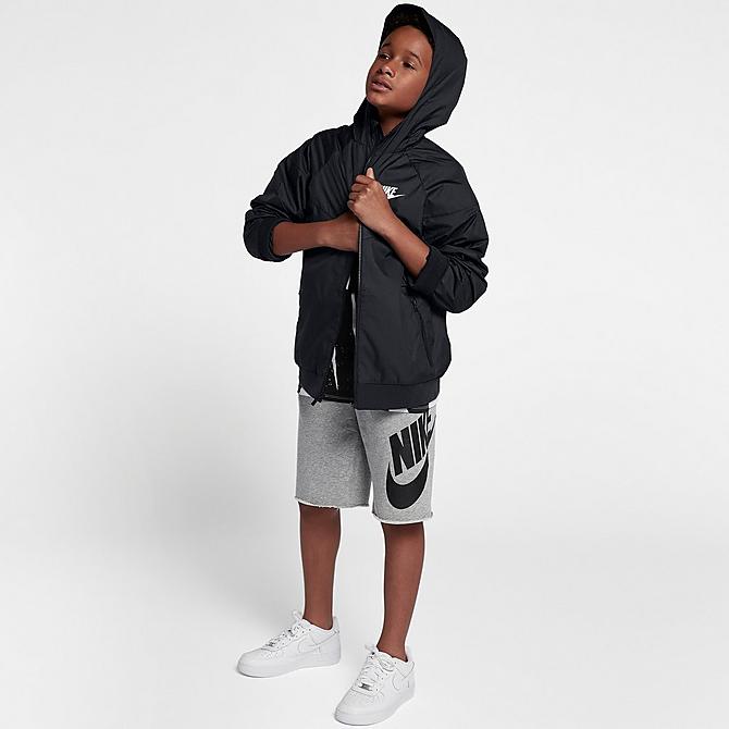 Back Left view of Boys' Nike Sportswear Windrunner Jacket in Black/Black/White Click to zoom
