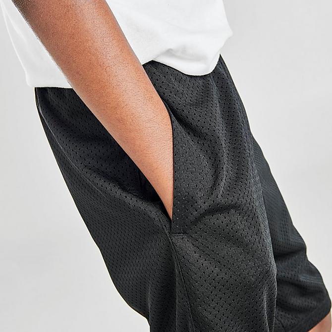 On Model 6 view of Kids' Champion Vertical Script Mesh Shorts in Black Click to zoom