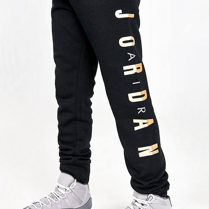 On Model 6 view of Boys' Little Kids' Jordan Highlight Allover Print Fleece Hoodie and Jogger Pants Set in Black/Gold Click to zoom