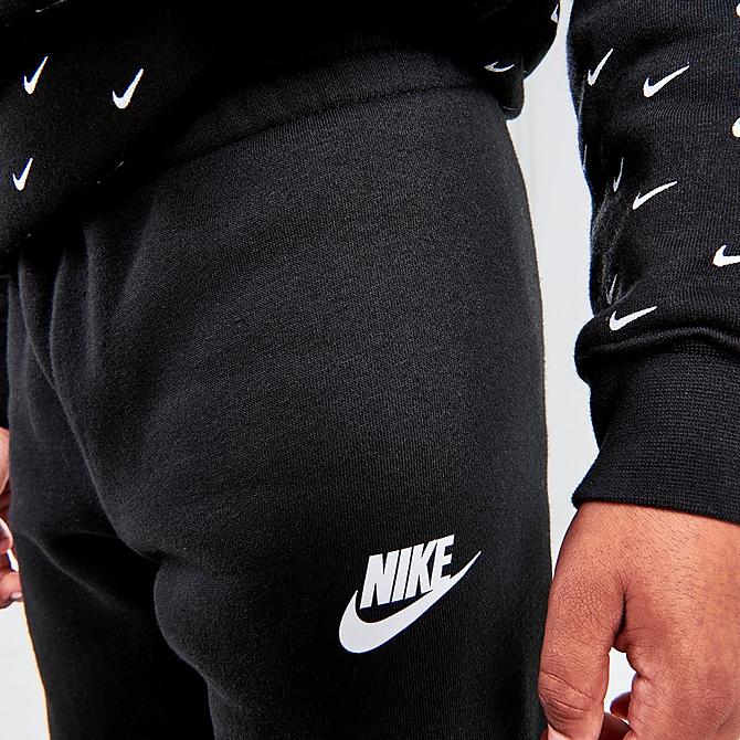 On Model 6 view of Little Kids' Nike Allover Print Swoosh Hoodie and Jogger Pants Set in Black/White Click to zoom