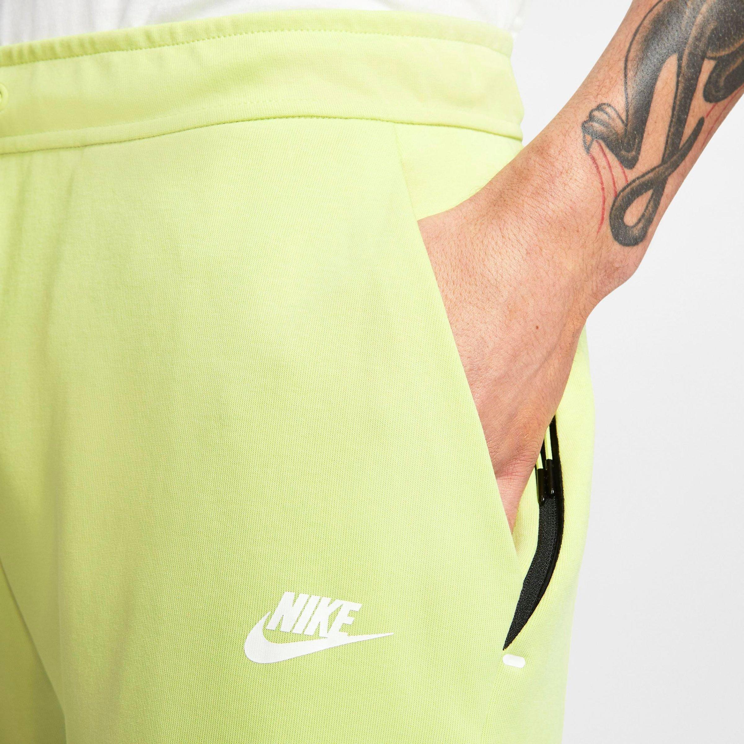 yellow nike fleece shorts