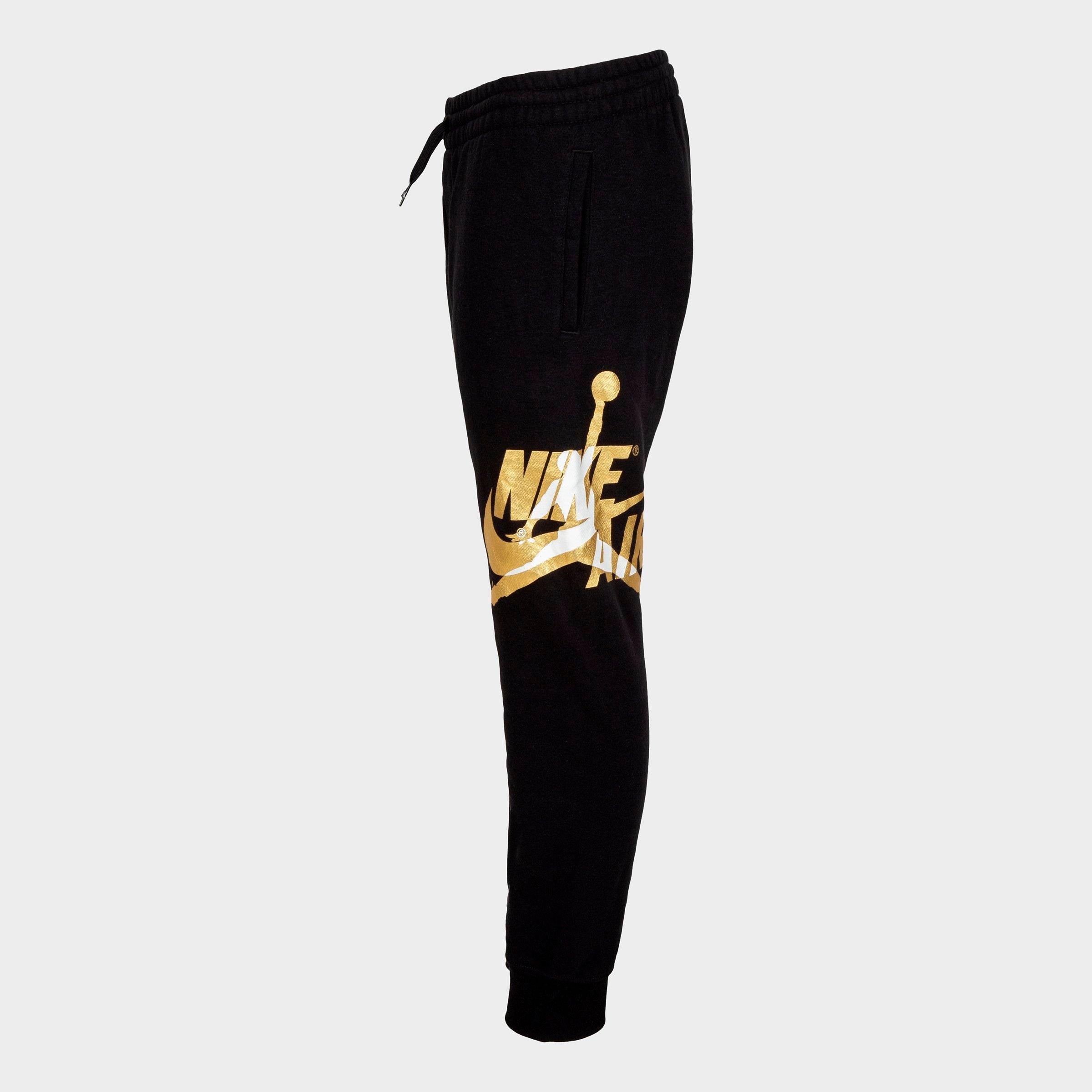 black and gold jordan pants