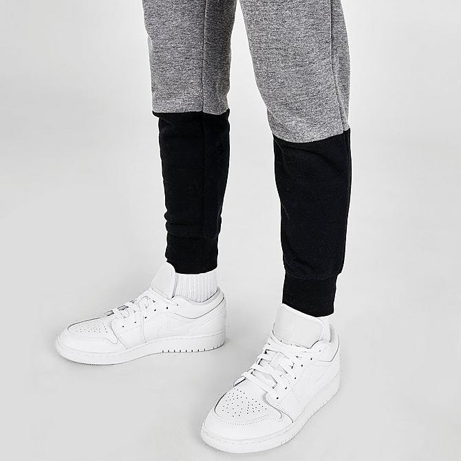On Model 6 view of Boys' Jordan Air Colorblock Fleece Jogger Pants in Carbon Heather/Black Click to zoom