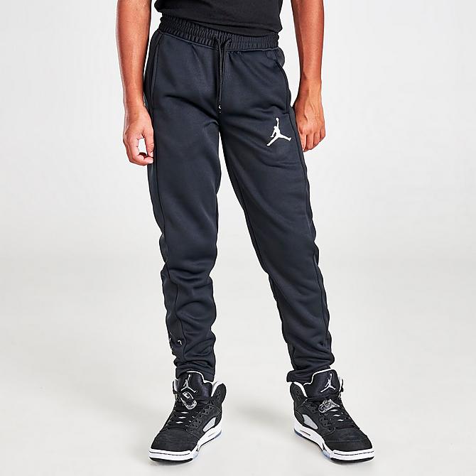 Front Three Quarter view of Kids' Jordan Therma Pants in Black Click to zoom
