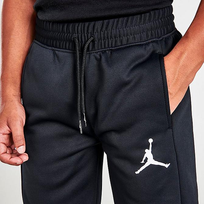 Back Right view of Kids' Jordan Therma Pants in Black Click to zoom