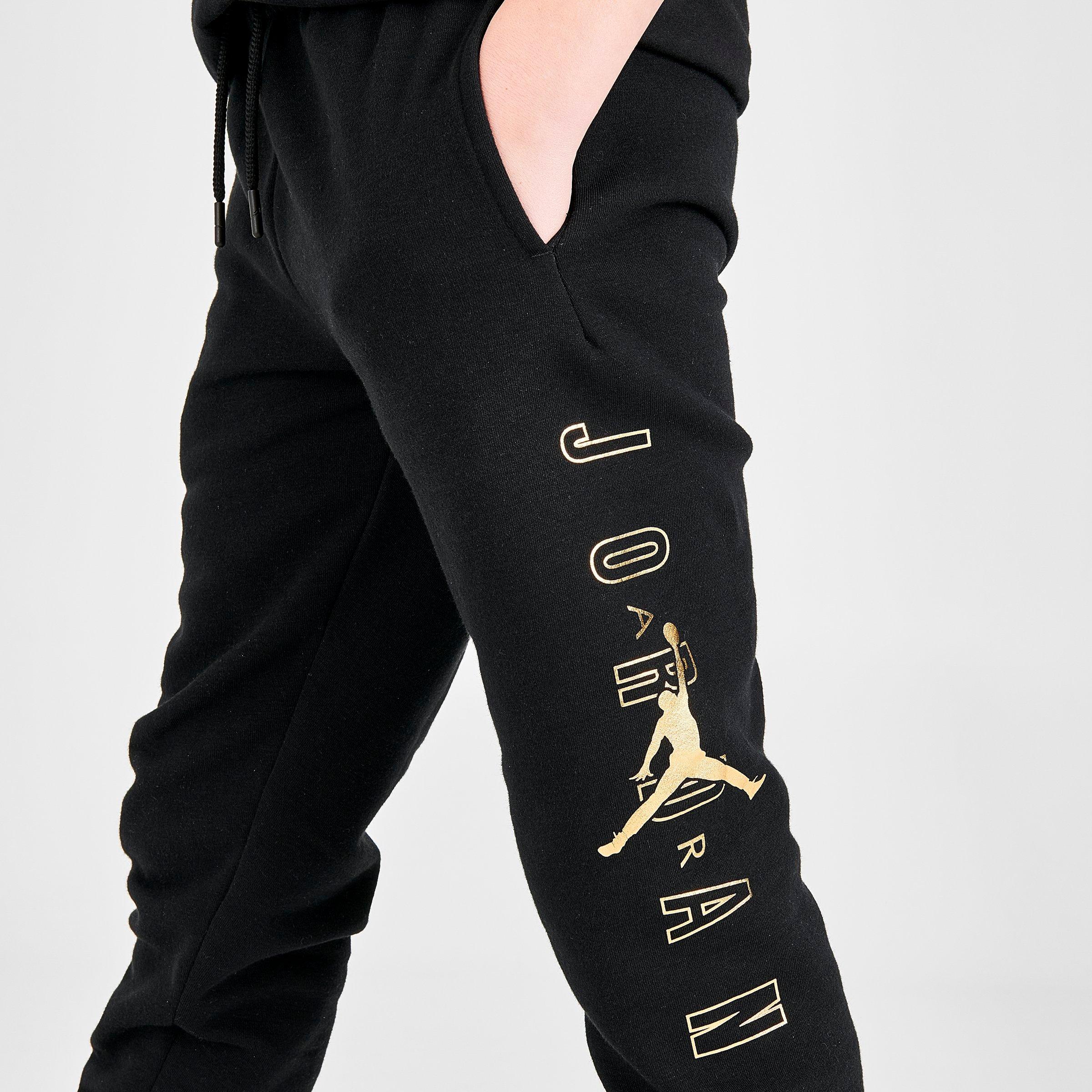 black and gold jordan pants