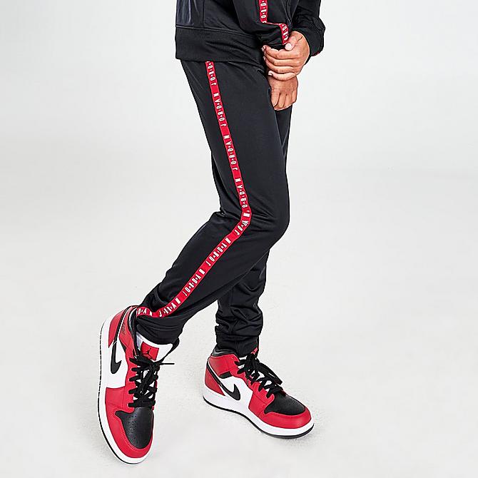 Back Right view of Boys' Jordan Tape Track Suit in Black/Red Click to zoom
