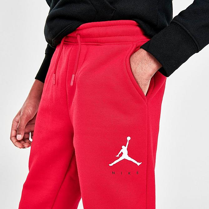 On Model 5 view of Boys' Jordan Jumpman by Nike Jogger Sweatpants in Red/Black Click to zoom