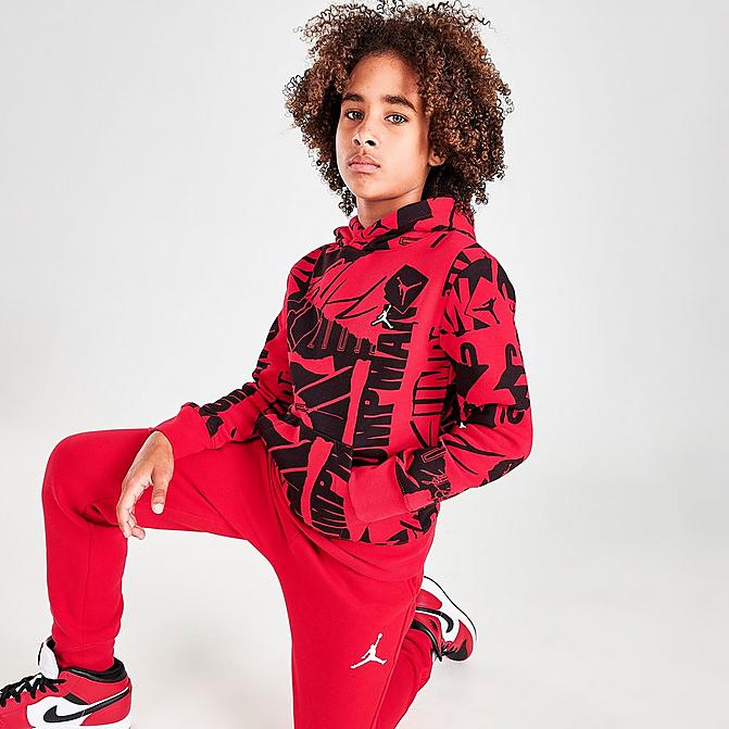 Front view of Boys' Jordan Essentials Allover Print Hoodie in Red/Black Click to zoom